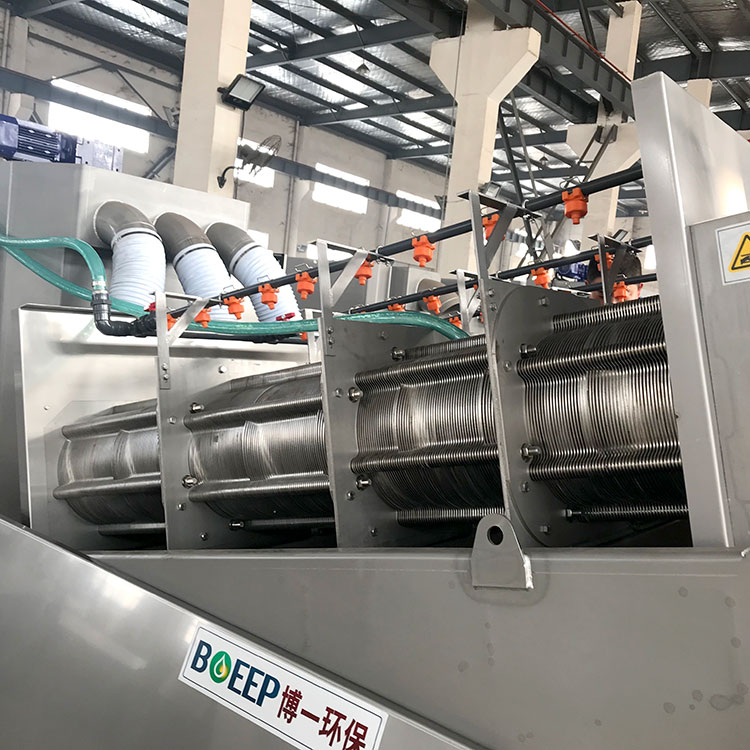 volute press sludge dehydrator El deshidratador de lodos de prensa volúte