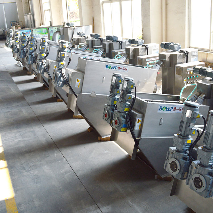 volute press sludge dehydrator El deshidratador de lodos de prensa volúte