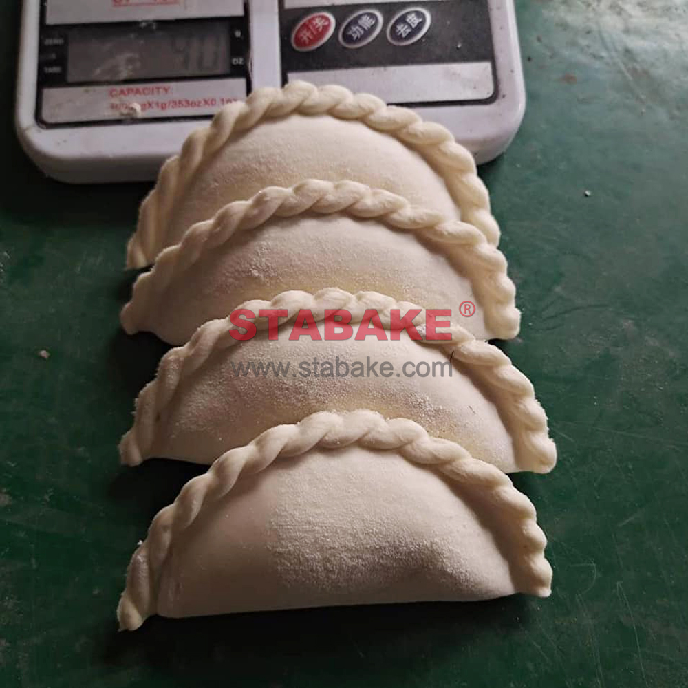 Máquina de fabricación de bola de masa automática para una gran empanada samosa pierogi revioli pelmeni 