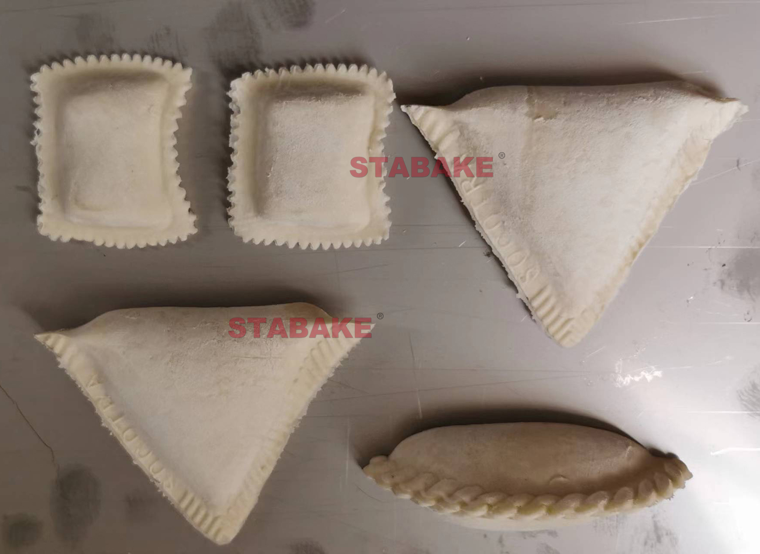 Máquina de fabricación de bola de masa automática para una gran empanada samosa pierogi revioli pelmeni 